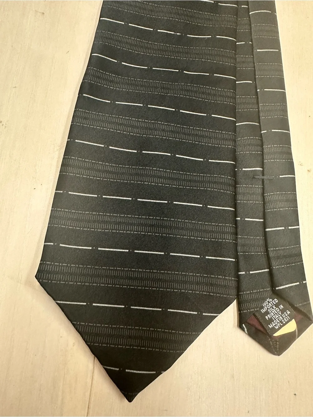 Men's Black Patterned Necktie with Subtle Gray Dash Lines